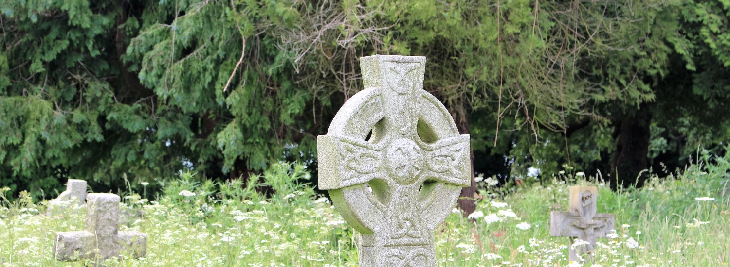 A cross marking a gravestone