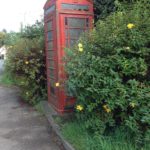 Red phonebox under renovation