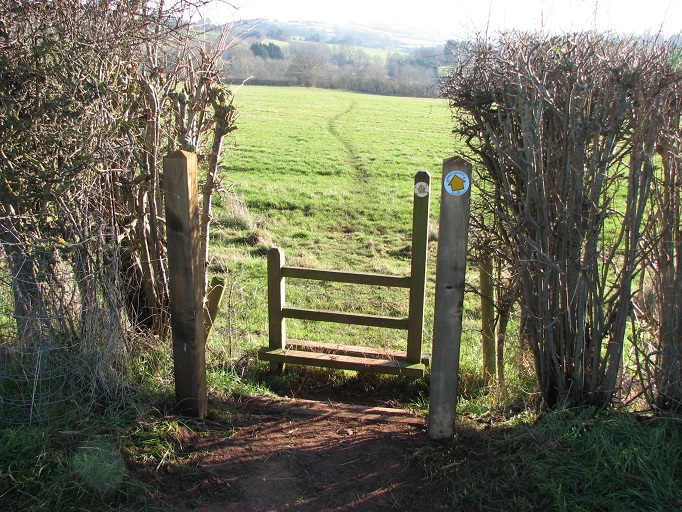 New wooden stile in the entrance to a field