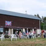 tables and chairs outside the village hall