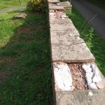 Stone wall with missing coping stones