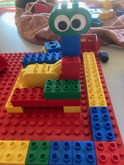 object made out of brightly coloured duplo bricks