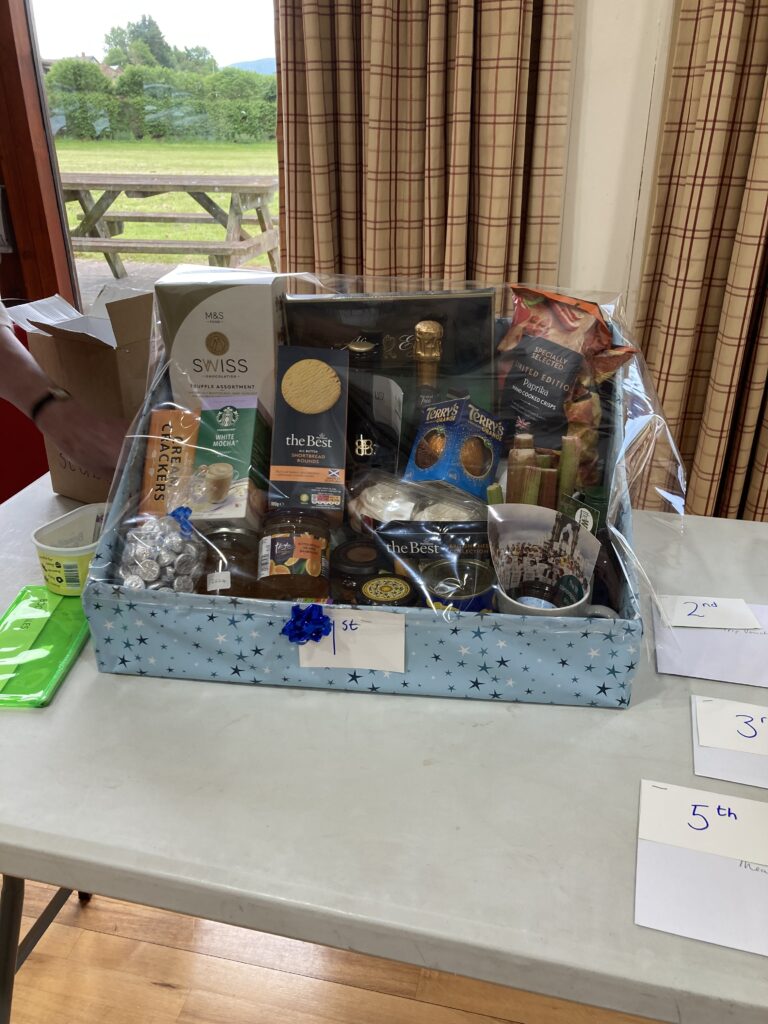 Hamper filled with chocolates and biscuits