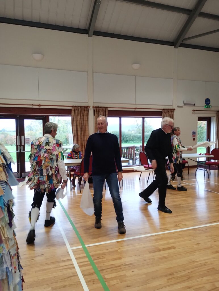 People dancing in the millennium hall